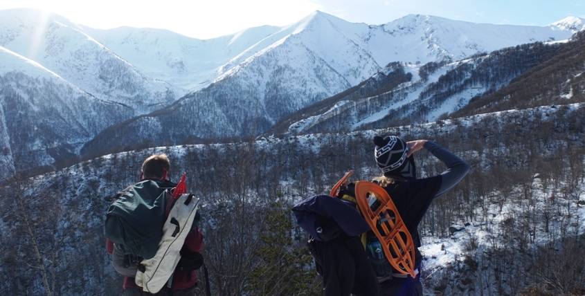 Snowshoeing hiking in the Alps