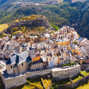 Picturesque autumn landscape with imposing medieval citadel in fortified township of Briancon in Hautes-Alpes department, France